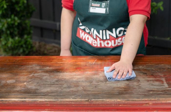 Bunnings TM removing dust from table
