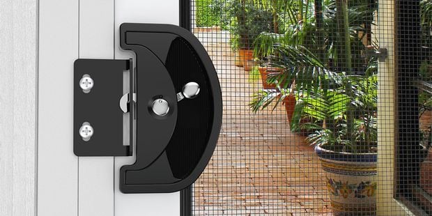A Rolltrak flyscreen installed to a main door.