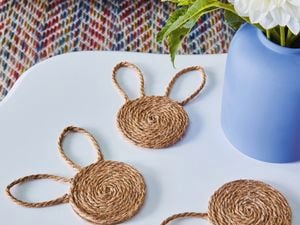 bunny shaped jute coasters on a  coffee table