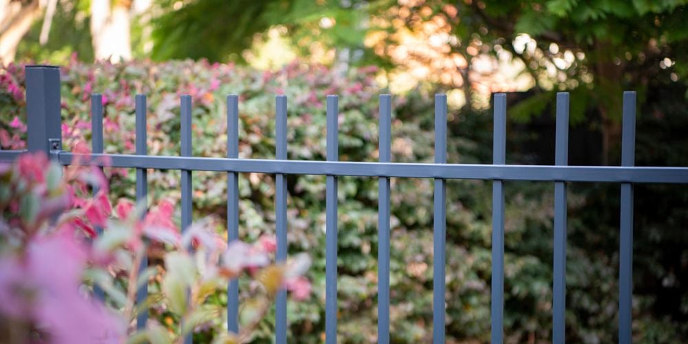 Close up of square tube fencing.