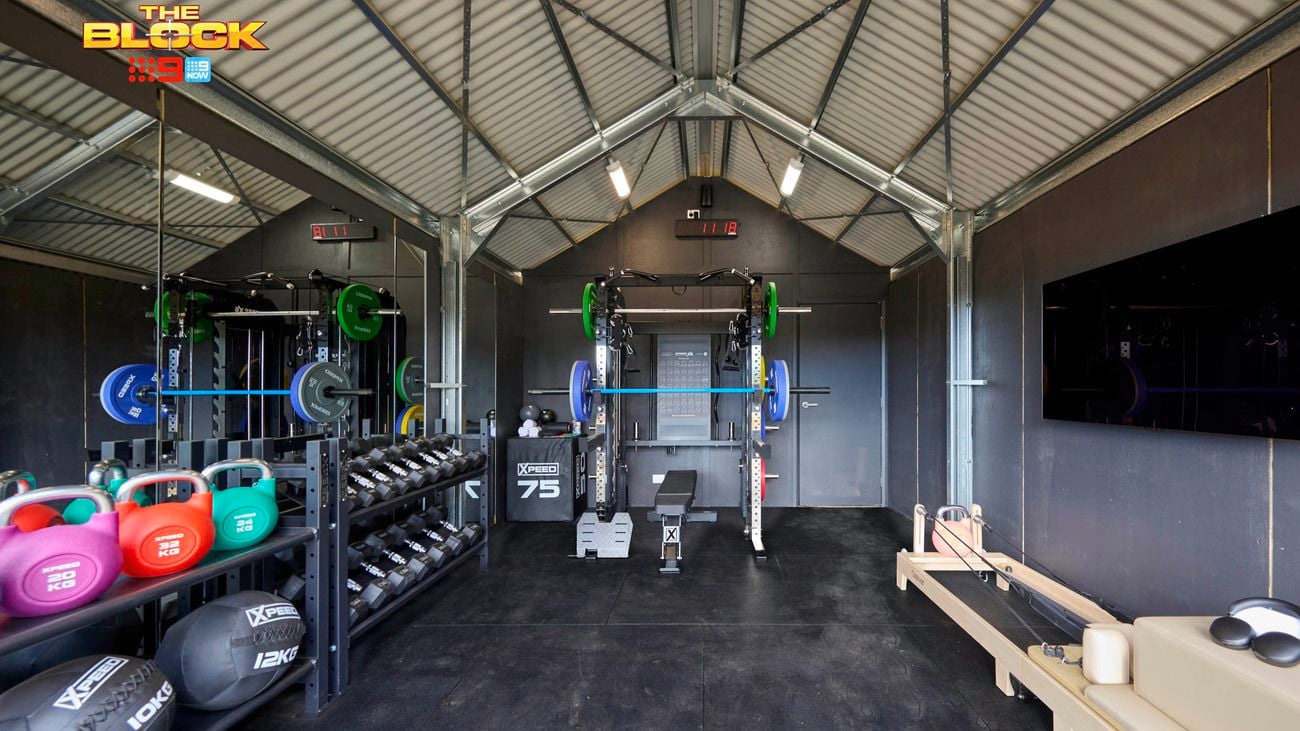 A room with gym equipment in it.