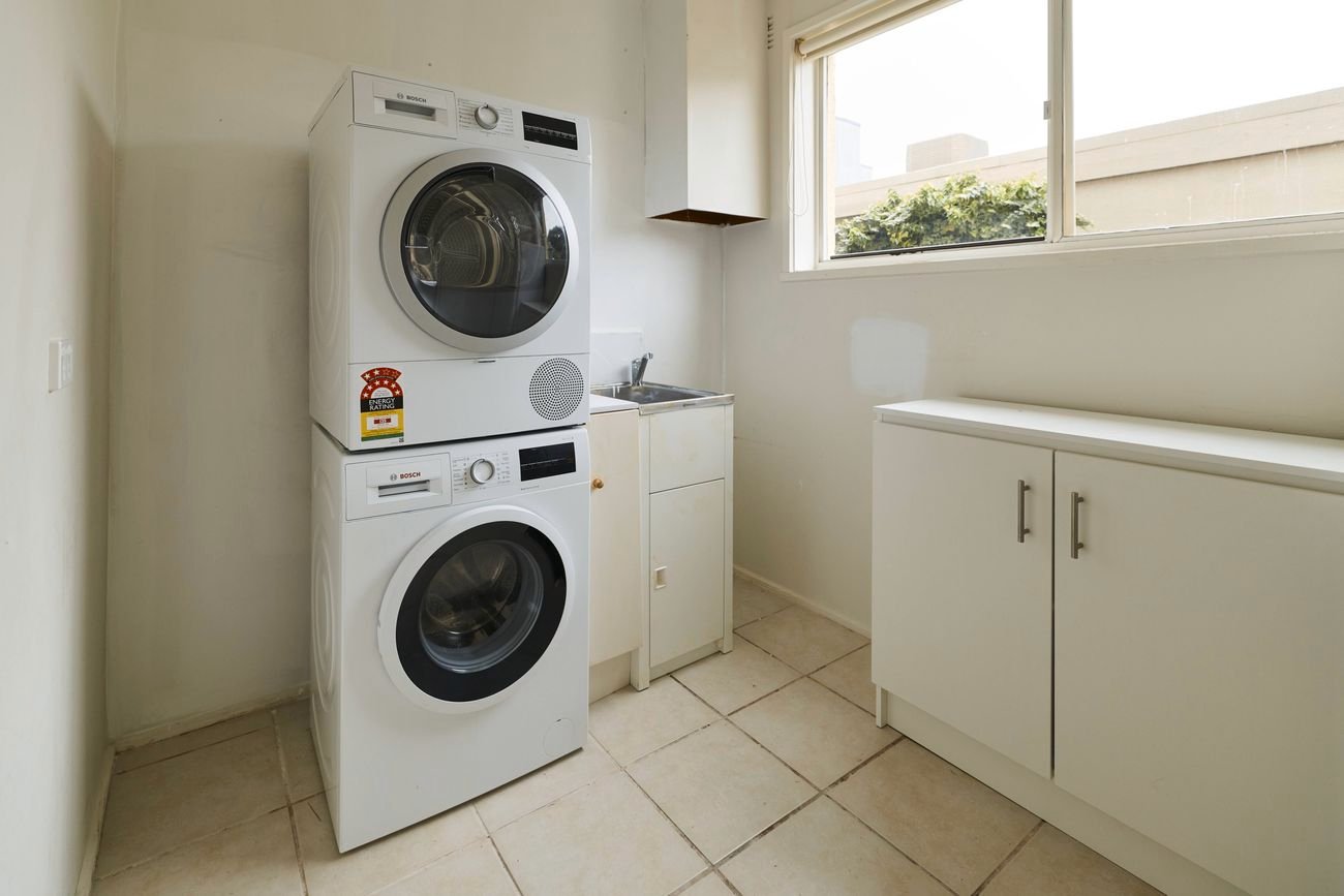 DIY Made Easy  - Smarter laundry layout with extra storage - Before