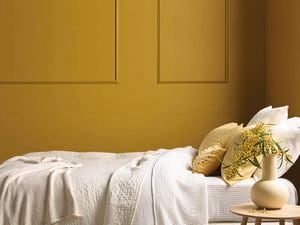 yellow wall in bedroom