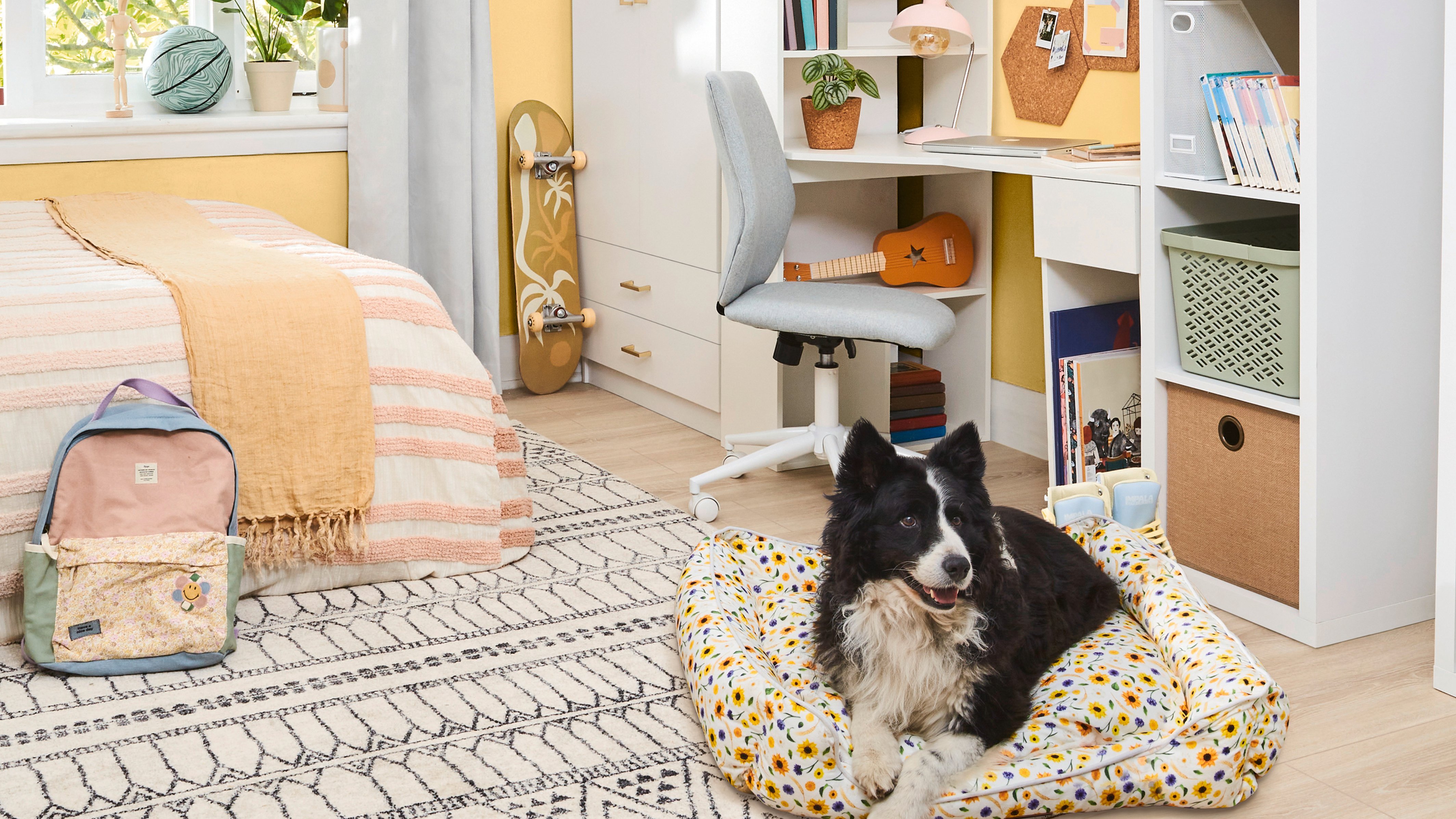 A teenager bedroom featuring yellow walls painted in Good To Go by British Paints