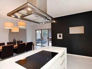 Using paint sprayer to paint walls