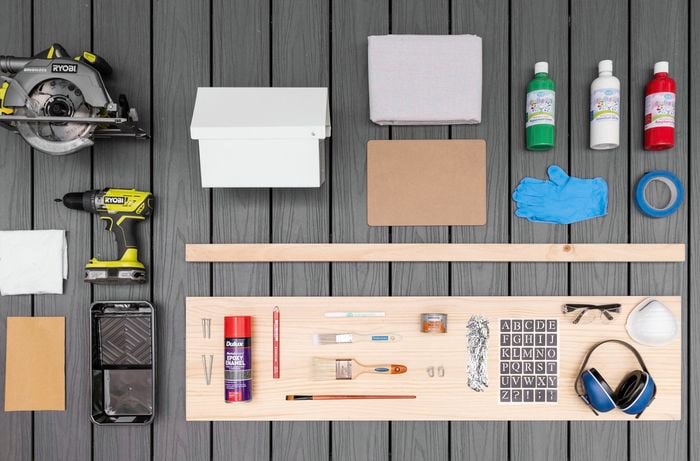 Circular saw, cordless drill, craft paint, ear muffs, glue and paint brush