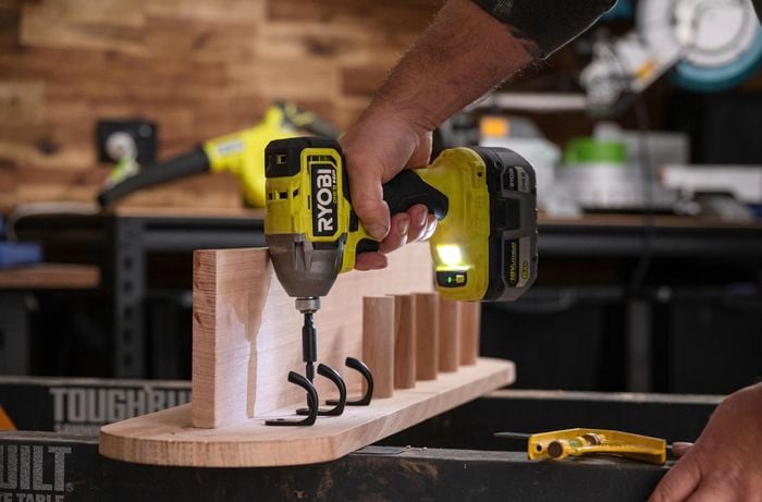 7. Mark and install metal hooks.jpg