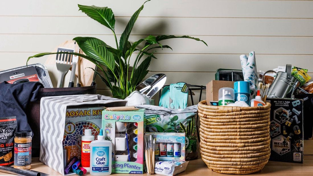 Selection of products including craft items, BBQ utensils, a plant and gardenting tools.