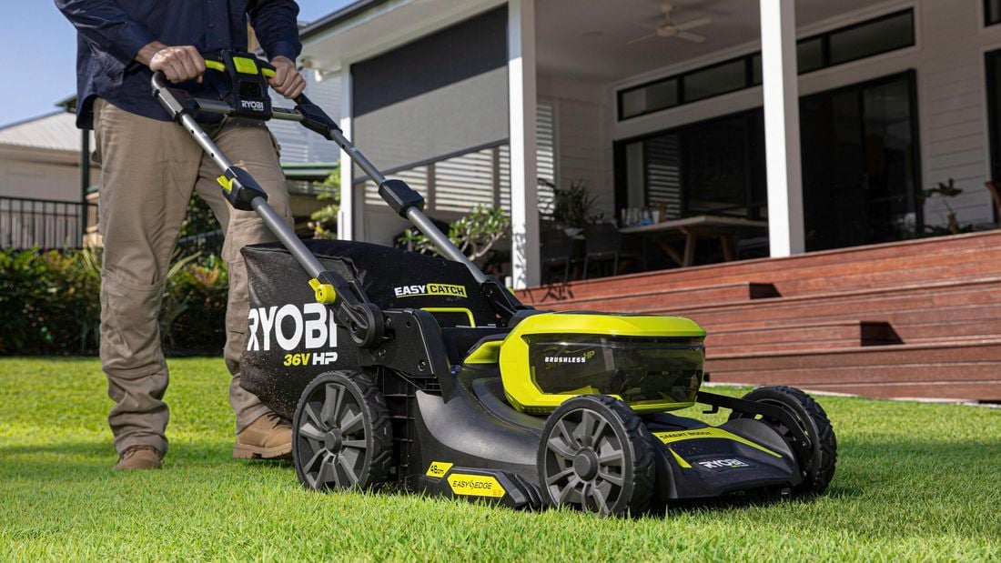 person mowing the lawn
