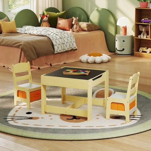Kids table and chairs in a bedroom with a bed, rug and storage unit in it.