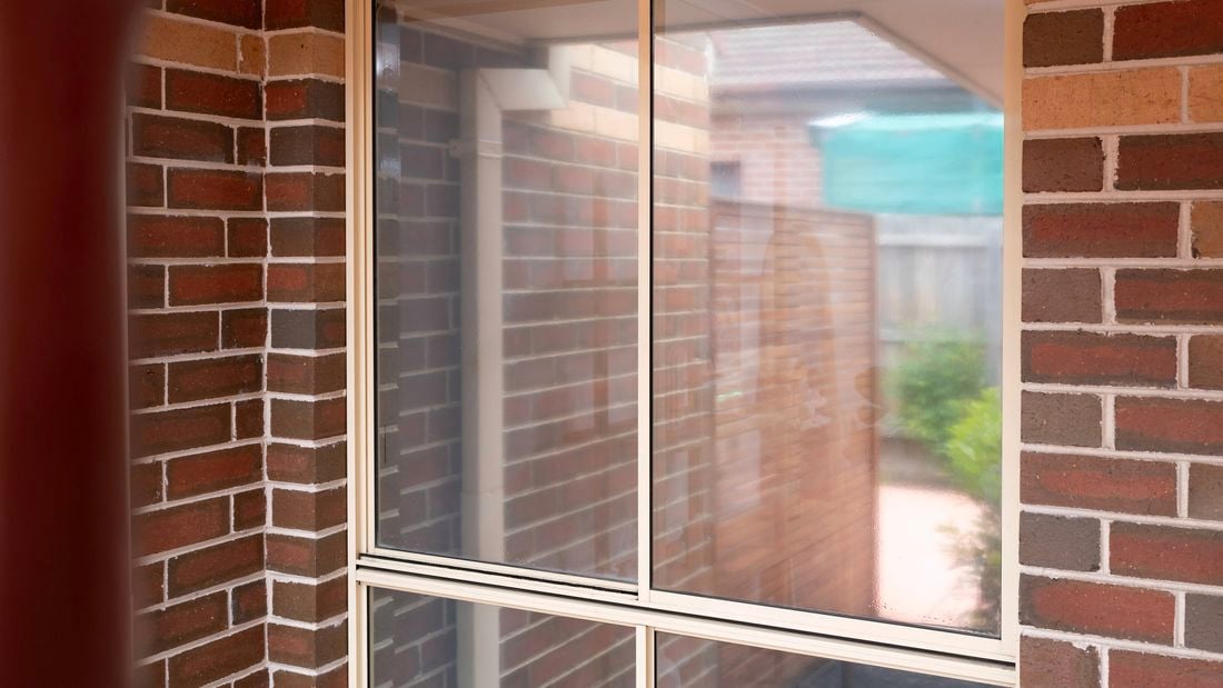 A window with newly applied film