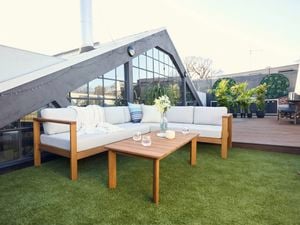 Corner outdoor lounge in roof terrace garden