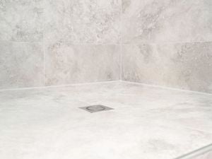 Freshly applied silicone sealant in a bathroom​
