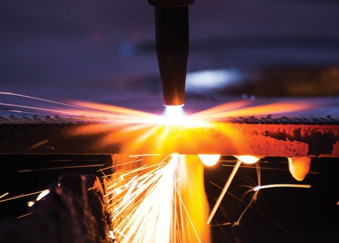 Closeup of a Tradeflame welding torch in action