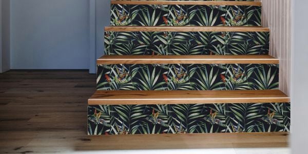 Staircase decorated with a wallpaper.