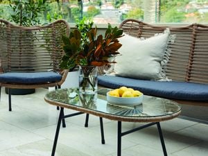 Table and chair set on rooftop balcony