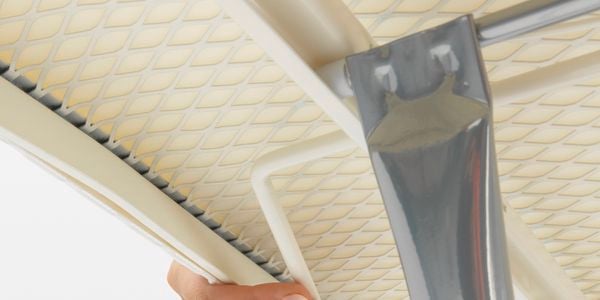 Adjustable height for ironing board