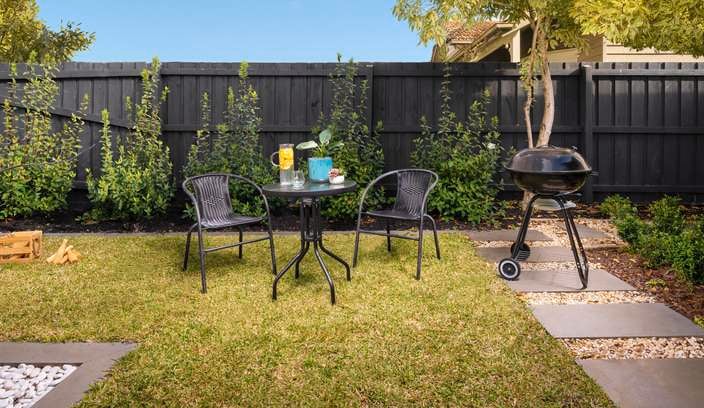 outdoor setting and BBQ in a backyard