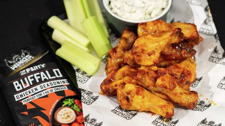 Buffalo chicken wings served with celery sticks, creamy dipping sauce and buffalo chicken seasoning.
