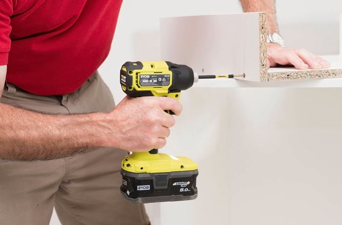 Attach the drawer side panels to the base