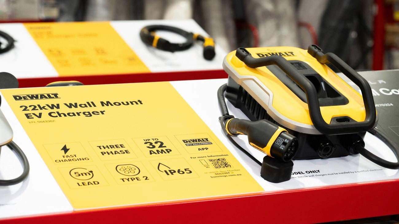 A DeWALT 22kW Wall Mount EV Charger highlighting features like fast charging, three-phase power, 32-amp capacity, IP65 rating, and compatibility with the DeWALT app.