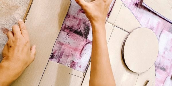 Cardboard shapes placed on art canvas