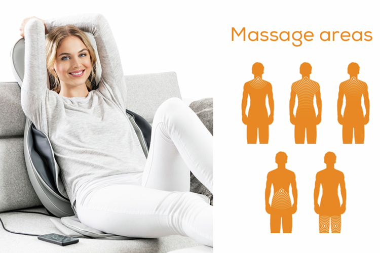 A lady sitting in a couch enjoying a massage