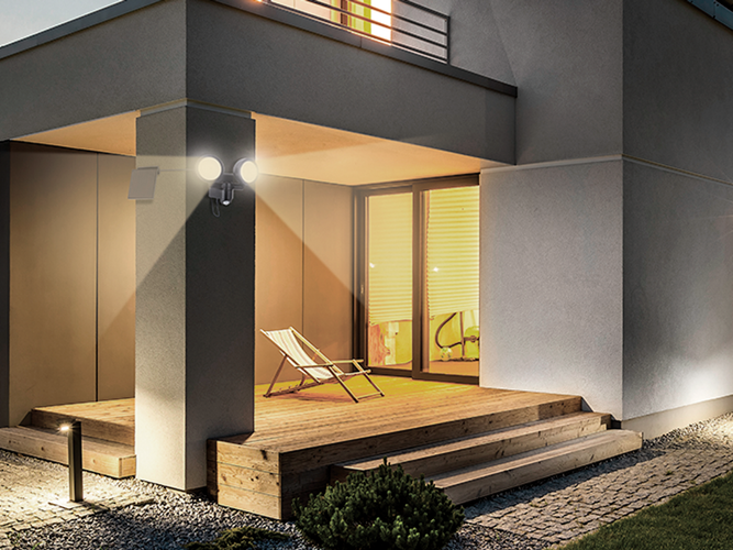 Solar powered movement activated sensor security light outdoors.