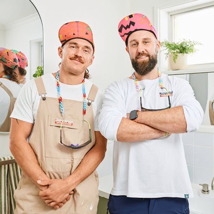 Ricky and Haydn portrait shot with a bathroom transformed in background