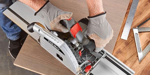 Saw being used on floorboards