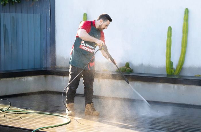 Deck surface rinse: Safeguarding timber after cleaning for lasting beauty.