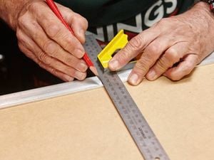 Measuring with a ruler and a pencil.