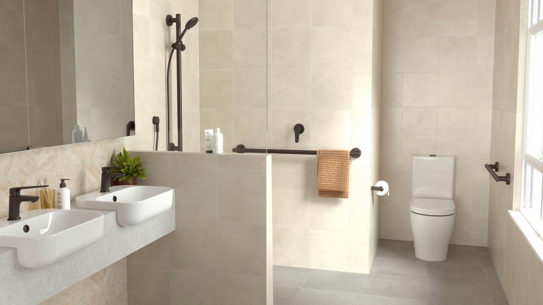 A contemporary tiled bathroom featuring black HomeCare by Caroma fixtures and fittings