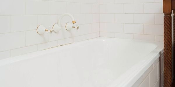Freshly painted white bathtub