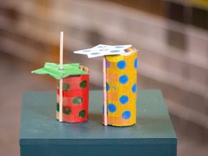 DIY kaleidoscopes are placed on the table.