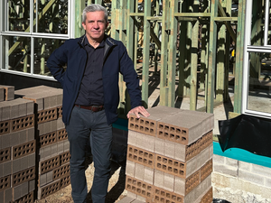 Stephen Thompson of Allworth Homes stands in front of Bunnings Trade supplied frame and truss