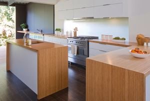 Kitchen with wooden benchtops and island bench