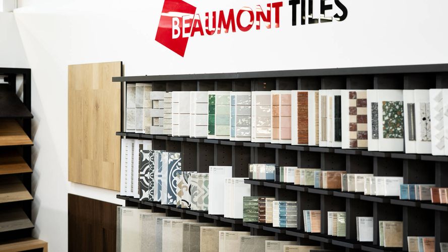 Beaumont Tiles showroom display featuring wall and floor tile samples in a range of colours, patterns and finishes.