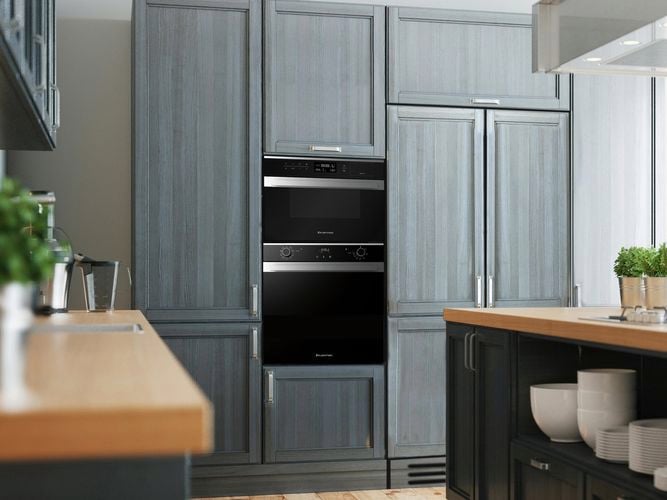 Washed blue timber kitchen with Steam Microwave Convection Oven, Mulrifunction Oven and  Fully Integrated Fridge Freezer