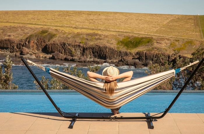 woman in hammock looking at view