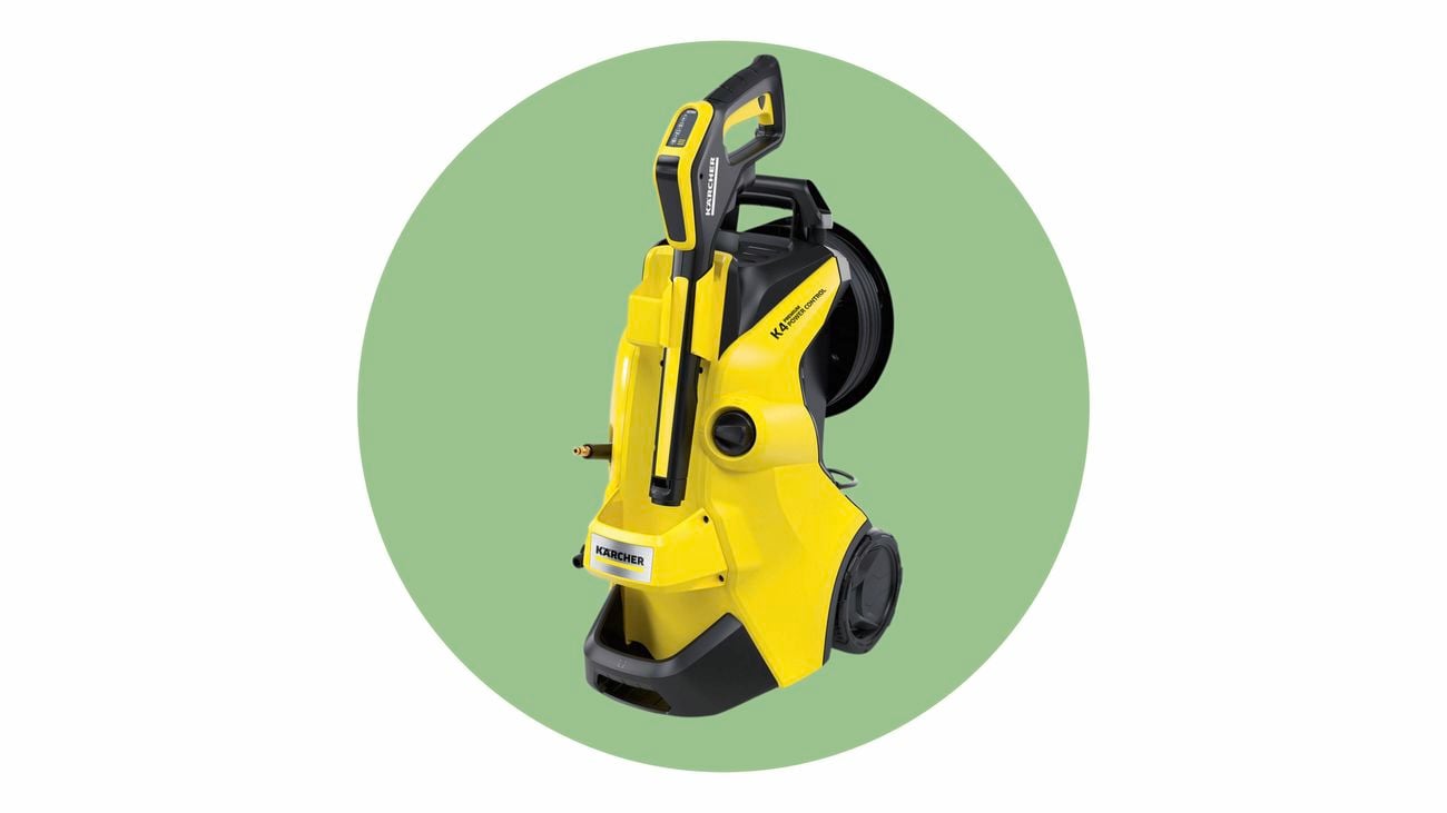 A close-up product shot on a green background of a Karacher pressure washer used for spring cleaning