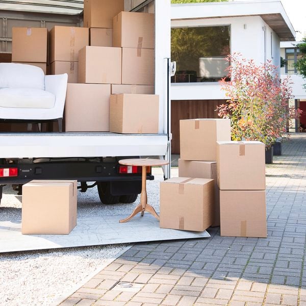 Packing boxes on a truck with table