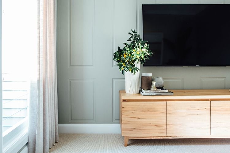 TV and hutch in a bedroom setting