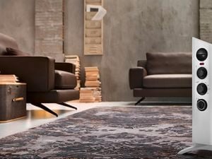 Heater in a lounge space with couches and cosy interior.