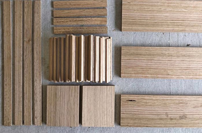 Timber in various sizes and shapes sitting on benchtop.