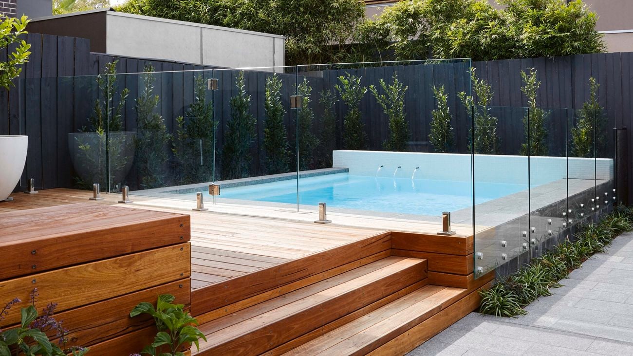 Timber decking surrounding an in-ground pool