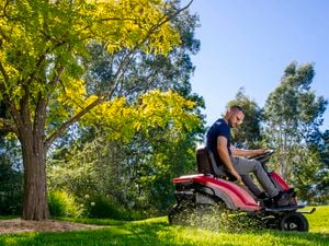 person on mower 