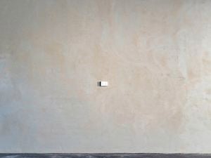 Newly rendered wall with clean finished surface