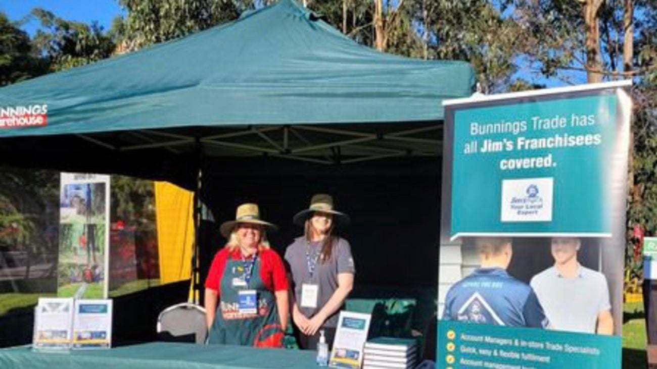 outside tent promoting Jims organisation