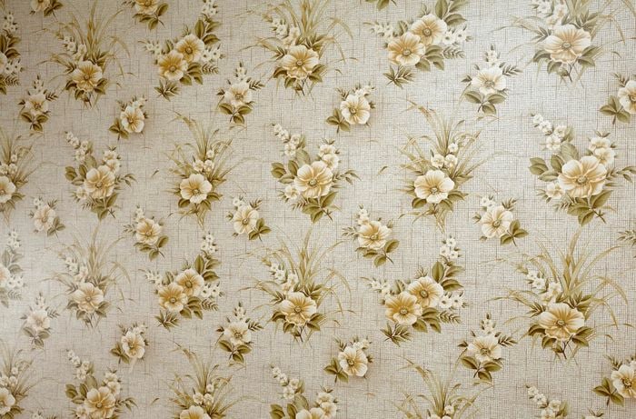 Before photo of old fashioned floral wallpaper